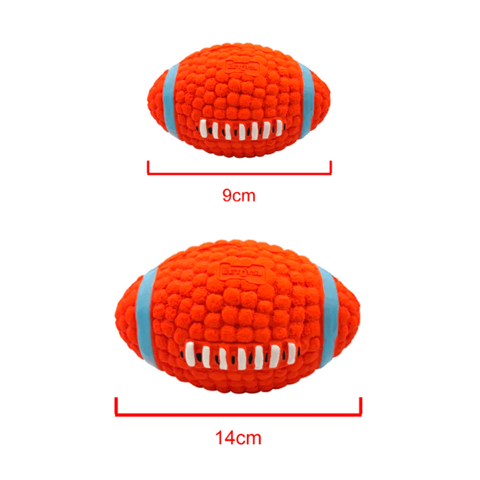 Duas imagens sobrepostas do mesmo brinquedo para cachorro em formato de bola de futebol americano, ilustrando diferentes tamanhos. A imagem superior mostra a bola com largura marcada como 9cm. Abaixo, a mesma bola é mostrada com uma largura maior, marcada como 14cm. Ambas são laranja com listras azuis e detalhes em branco, e exibem o logotipo da marca em relevo na parte superior.